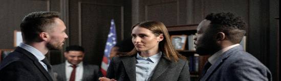 approachable legal services advisor, cheerful disposition, providing legal aid information, photorealistic, consultation room with brochures and banners, highly detailed, desk with computer, 4k resolution, soft pastels, gentle indoor light, shot with a 35mm lens